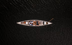 Leather Travel Chess Set, aerial view of two people playing chess on the board in a canoe on dark water