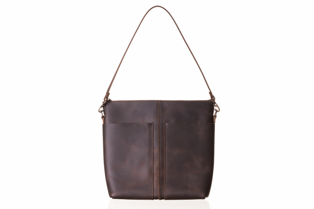 Minimal Leather Bag in dark brown, front view with two slip pockets and shoulder strap