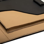 Large Leather Portfolio in Black, close-up of the tan leather interior pocket and stitched edges