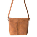 Minimal Leather Bag in cognac, front view with two slip pockets and adjustable crossbody strap
