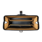 Spurgeon Briefcase in Raven Black, top-down view of the open frame mouth showing tan-lined compartments