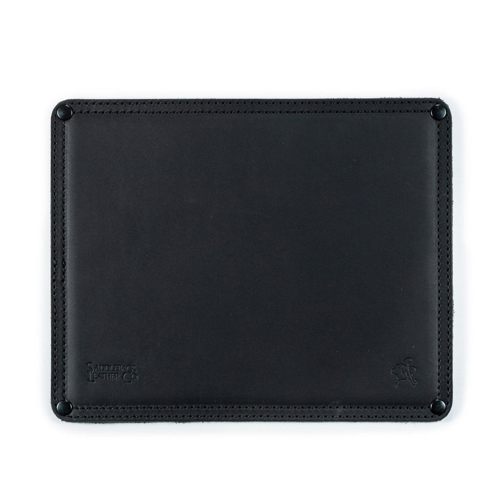 Mouse Pad in Black leather, top-down view with stitched border, corner rivets and embossed logo