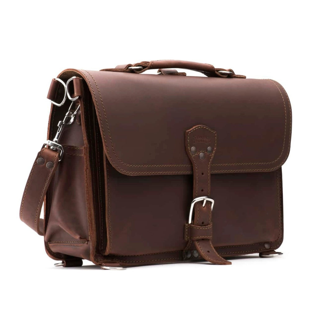 Slim Leather Briefcase in Chestnut, angled front view with buckle closure