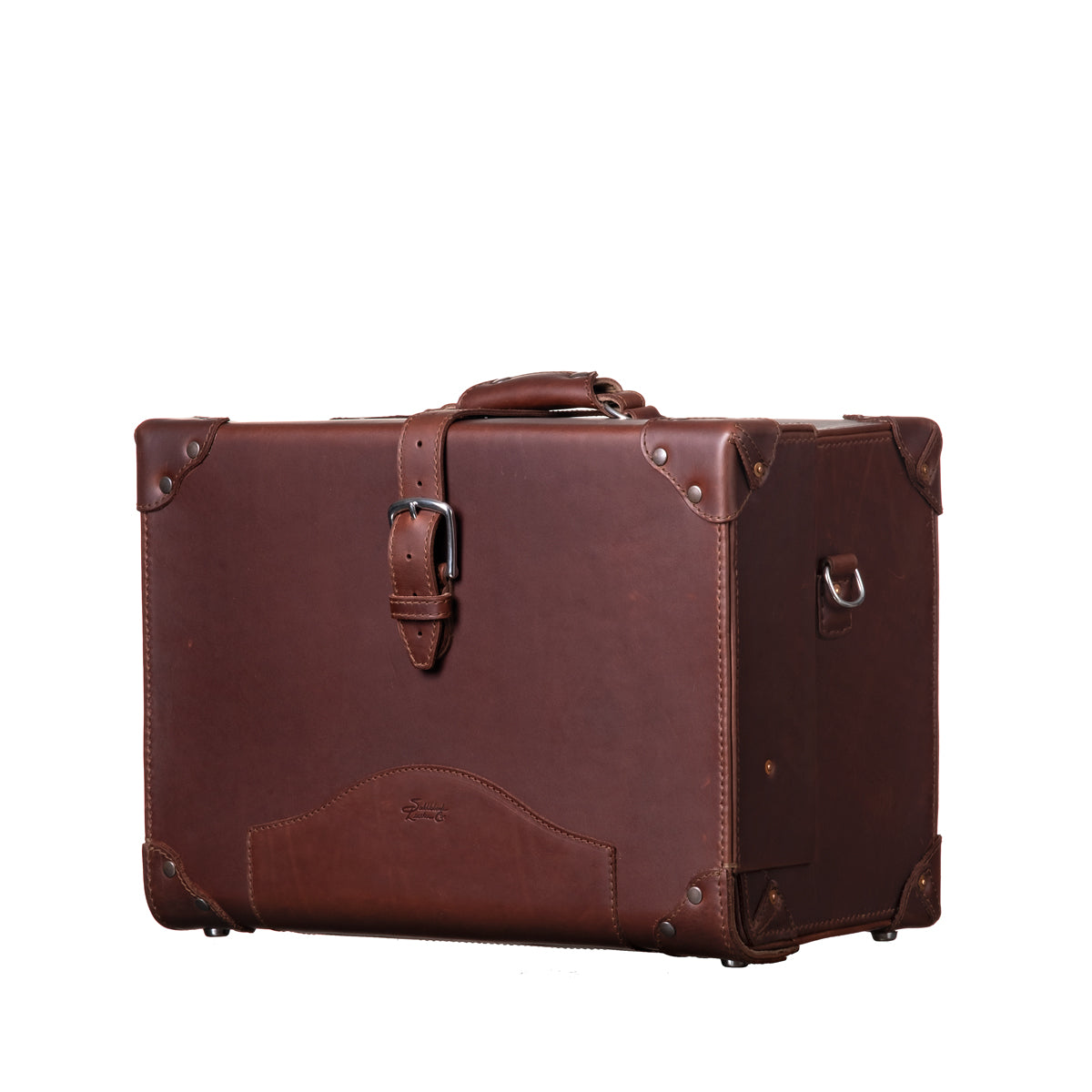 Grandfather Overnight Case in Chestnut, angled front view with top handle, buckled strap and metal corner caps