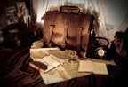 Large Classic Leather Briefcase in a sepia-toned scene with old maps, open books, a clock and a compass