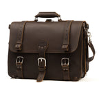 Large Classic Leather Briefcase in Dark Coffee Brown, front view with top handle, buckled flap straps and shoulder strap