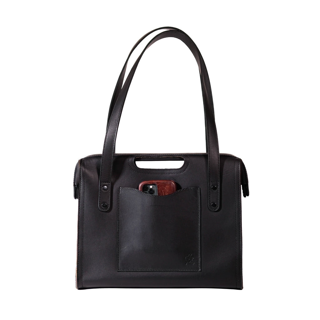 Professional Leather Tote in Black, front view with shoulder handles, cutout grip and a phone in the front pocket
