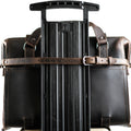 Leather Luggage Strap in Dark Coffee Brown buckled around a briefcase to secure it to a rolling suitcase handle