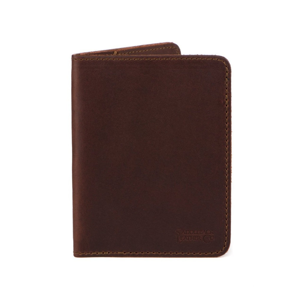 Slim Passport Wallet in Chestnut standing closed, front view with embossed logo
