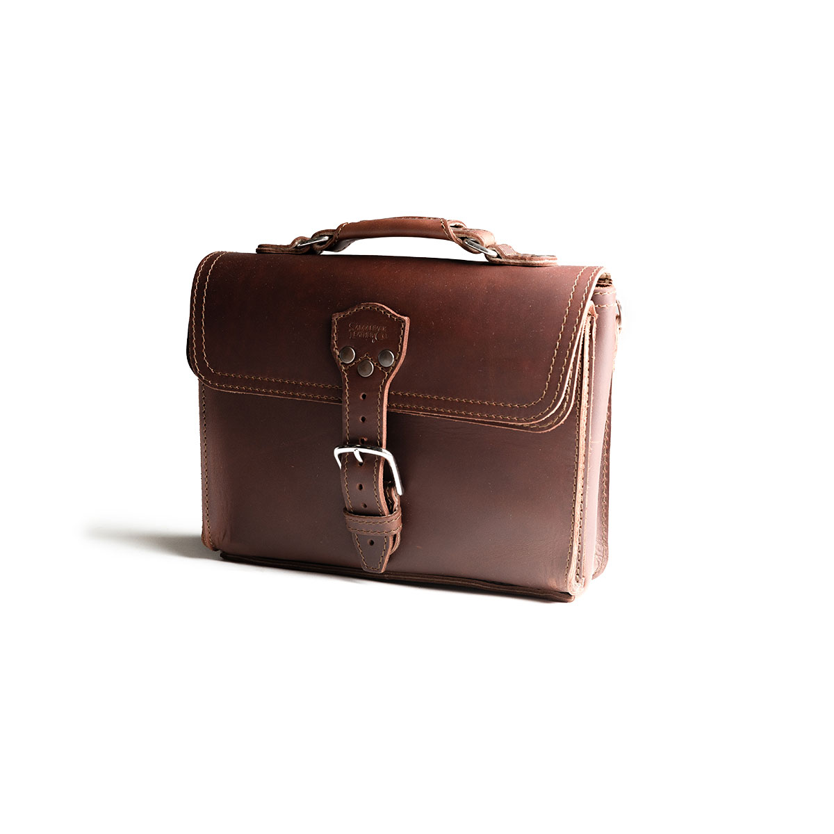Front Pocket Leather Satchel in Chestnut, angled front view with top handle and buckled front pocket