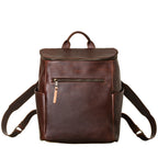 All in One Leather Backpack in Chestnut, front view with zippered front pocket and side pockets
