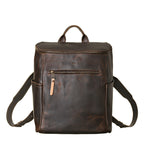 All in One Leather Backpack in Dark Coffee Brown, front view with zippered front pocket and side pockets