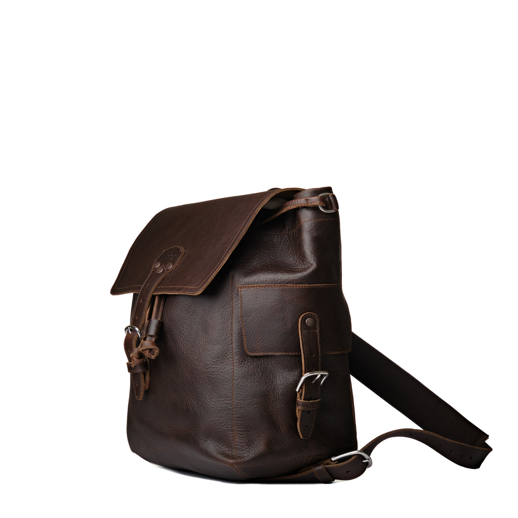 16" Drawstring Backpack in Dark Coffee Brown, angled front view with buckled flap, side pocket and strap