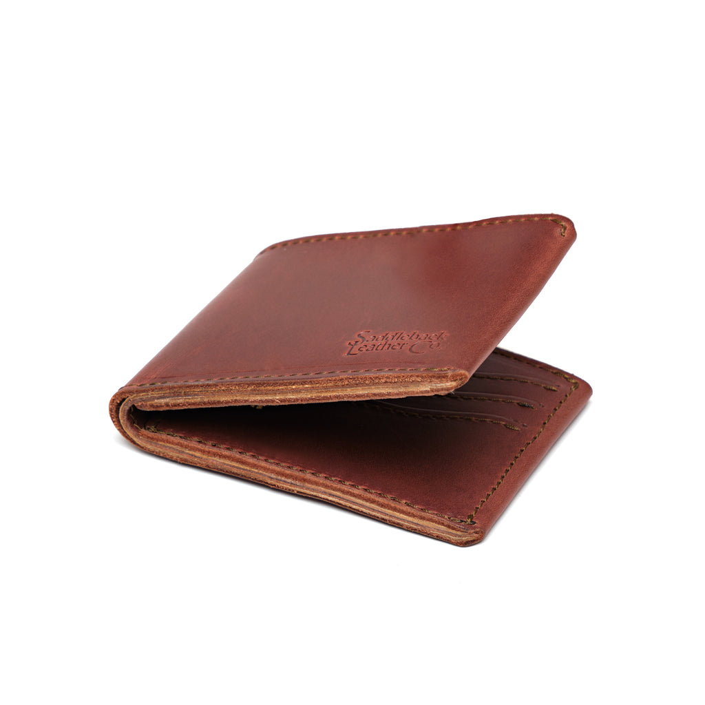 Medium Bifold Wallet in Chestnut, angled view slightly open with embossed logo and stitched edges