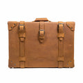 Grandfather Medium Suitcase in Tobacco, front view with three buckle straps and riveted corner caps