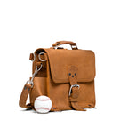 Photographer's Satchel in Tobacco, angled front view with a baseball for size