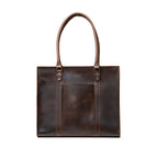 Women's Work Tote in Dark Coffee Brown, front view with riveted shoulder handles and front slip pocket