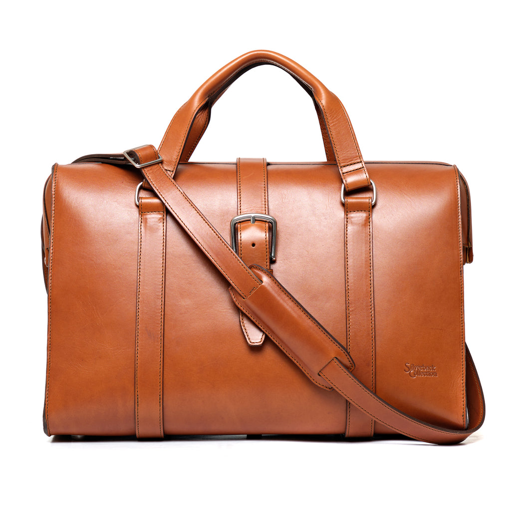 Taylor Duffle Bag in English Tan, front view with center buckle strap and shoulder strap