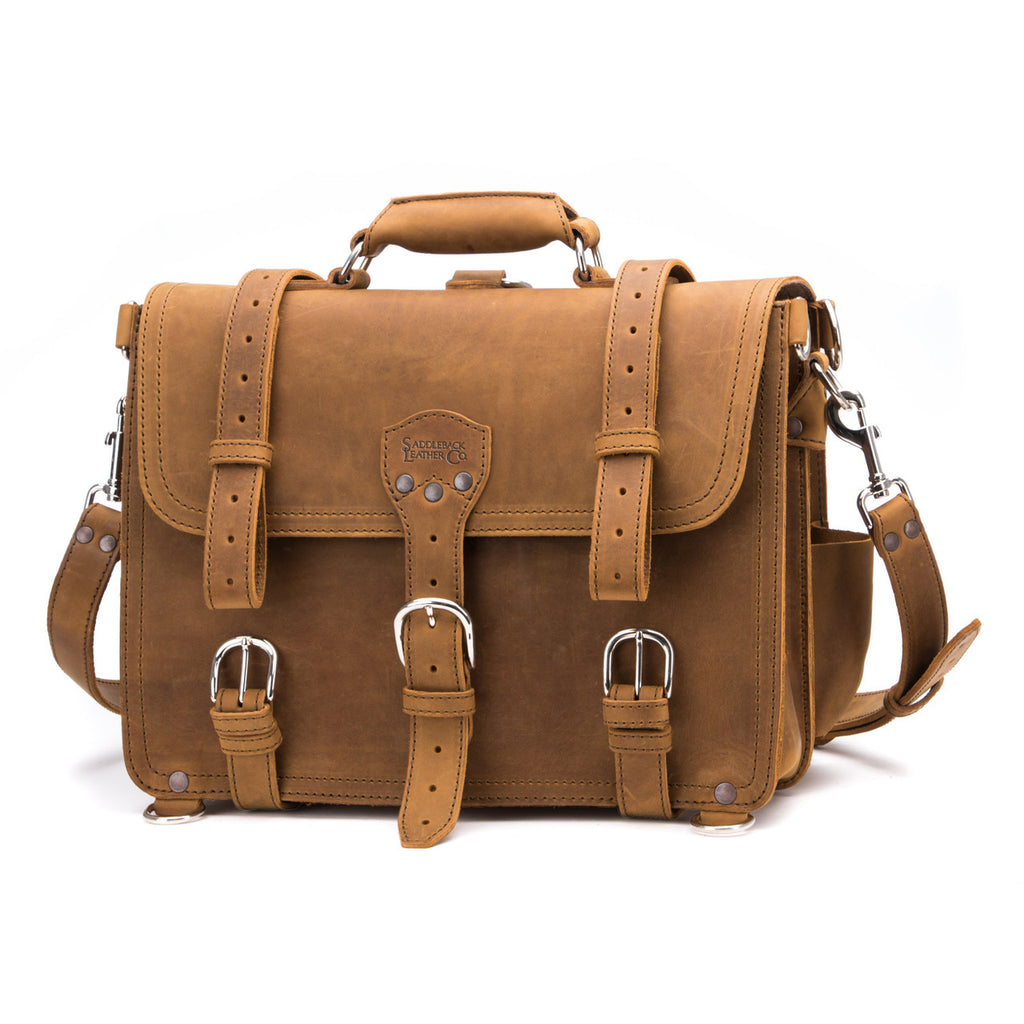Large Classic Leather Briefcase in Tobacco, front view with buckled flap straps, front pockets and shoulder strap