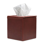 Tissue Box in Chestnut leather, angled front view with stitched edges and a tissue pulled from the top slot