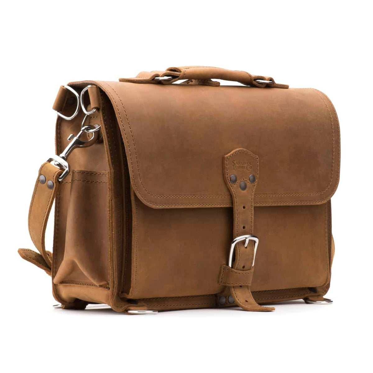 Slim Leather Briefcase in Tobacco, angled front view with buckled flap, top handle and shoulder strap