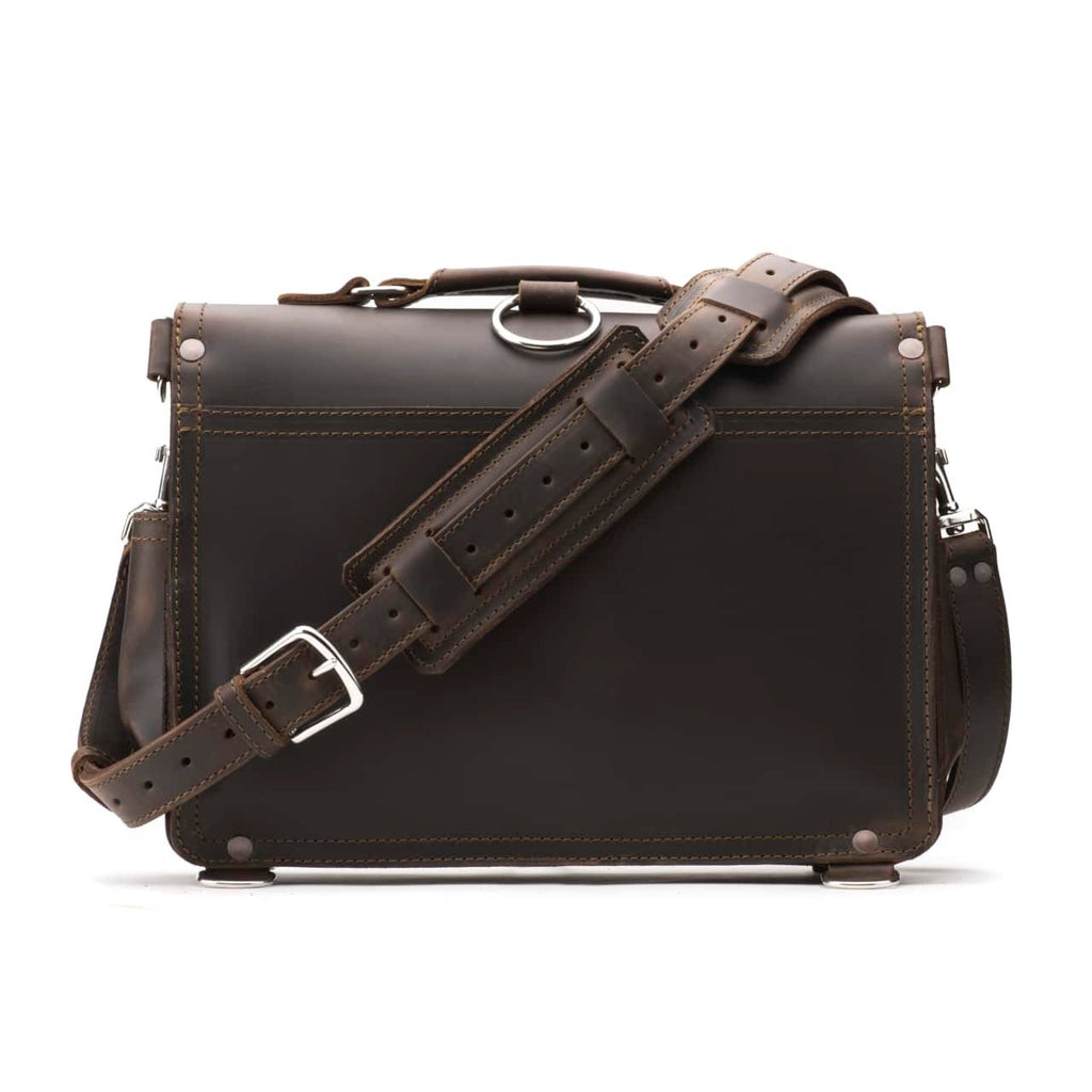 Slim Leather Briefcase in Dark Coffee Brown, back view with padded shoulder strap and luggage handle pass-through