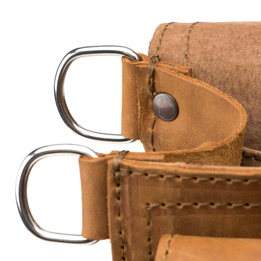 Slim Leather Briefcase in Tobacco, close-up of steel D-rings, copper rivet and hand-stitched side straps