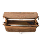Slim Leather Briefcase in Tobacco, top view open showing a laptop, passport and papers inside