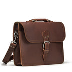 Fourteener Thin Leather Briefcase in Chestnut, angled front view with top handle, buckled flap and shoulder strap