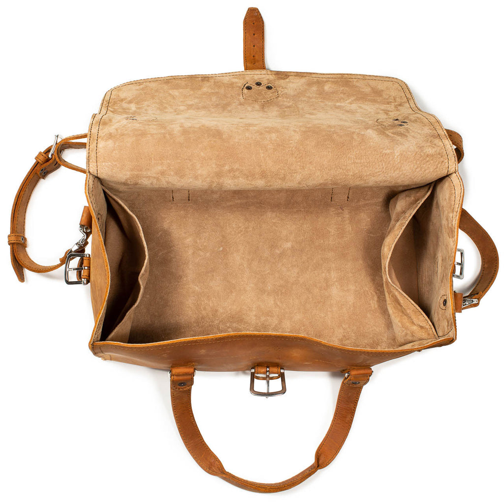 20" Baby Beast Duffle Bag in Tobacco, top view with flap open showing the suede-lined interior