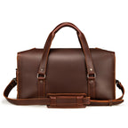 20" Baby Beast Duffle Bag in Chestnut, back view with handles and padded shoulder strap