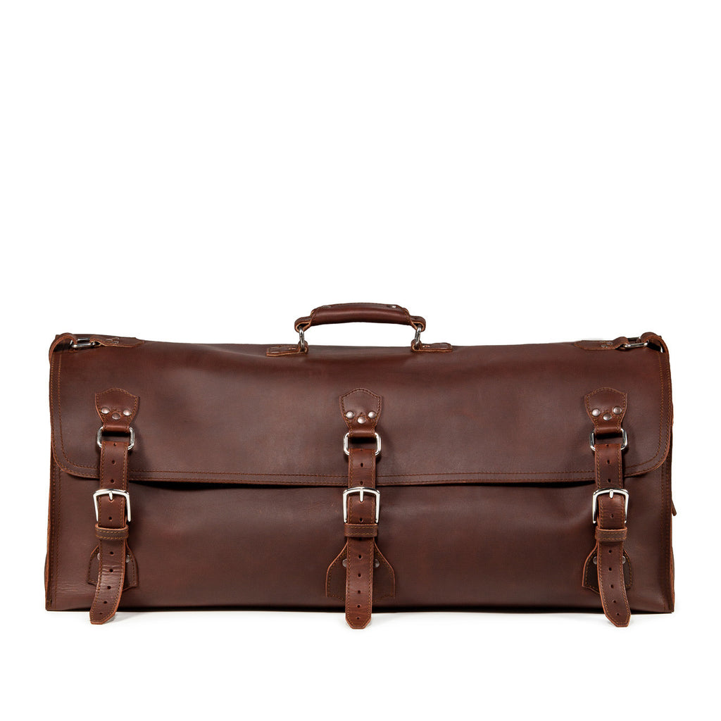 34" Beast Duffle Bag in Chestnut, front view with three buckle straps and top handle