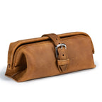 Little Big Mouth Toiletry Bag in Tobacco, angled front view with wide frame opening and buckled strap closure