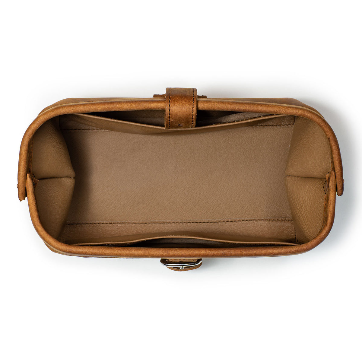 Little Big Mouth Toiletry Bag in Tobacco, top view open and empty showing the wide mouth and lined interior