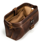 Little Big Mouth Toiletry Bag in Dark Coffee Brown, angled view with the frame mouth open showing the lined interior