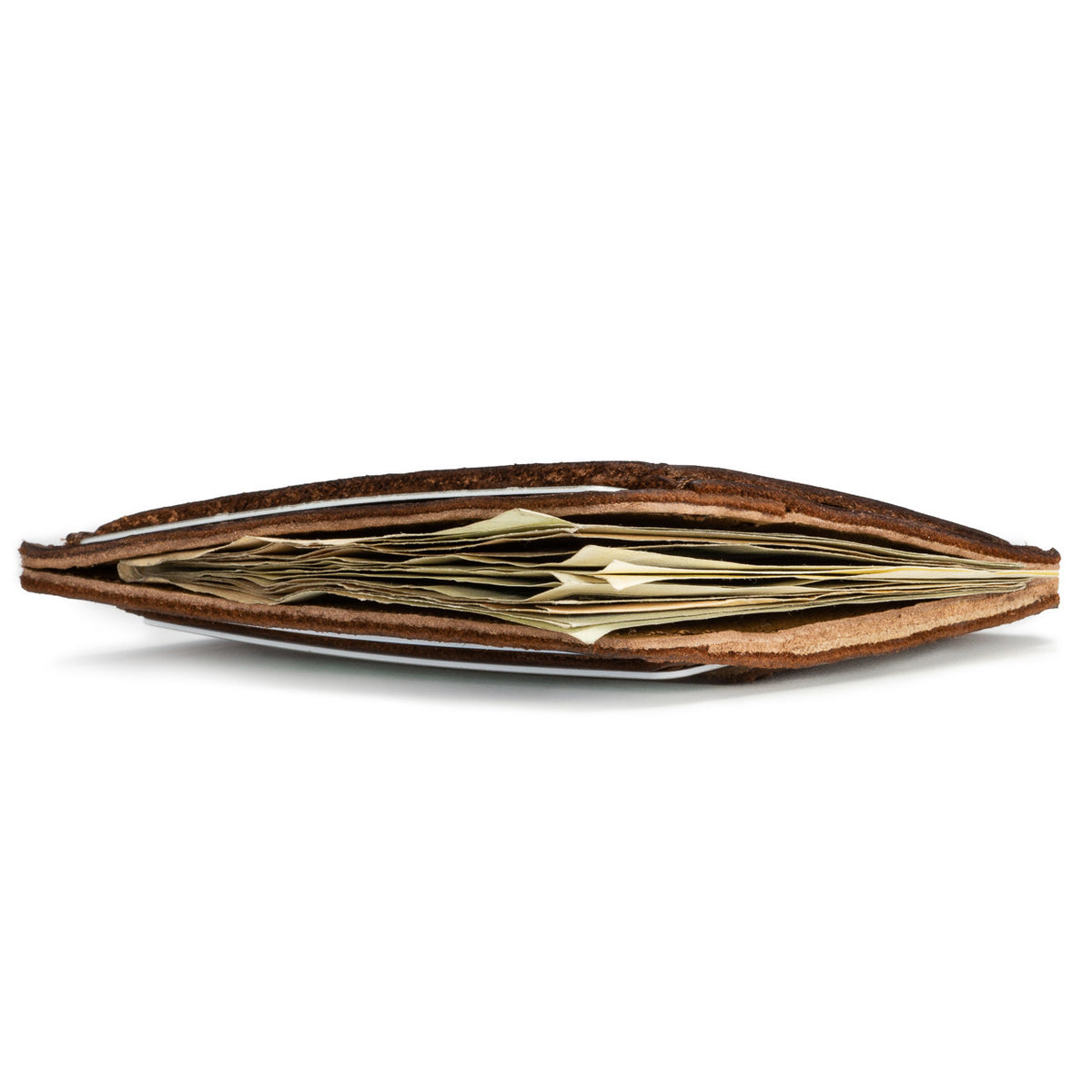 Front Pocket Leather ID Wallet, edge-on view showing folded cash packed between the leather layers