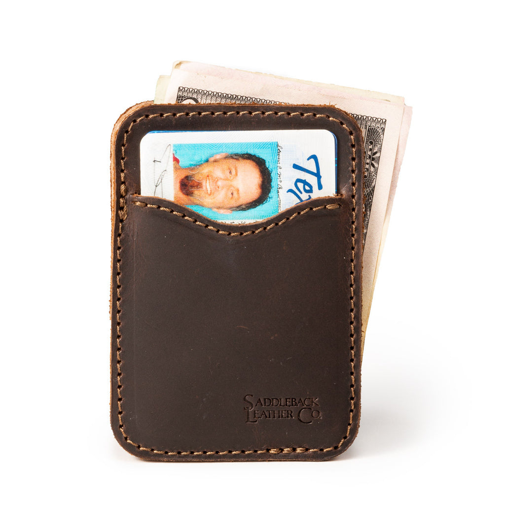 Slim Leather Card Wallet in Dark Coffee Brown with an ID card in the front pocket and folded cash behind
