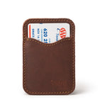 Slim Leather Card Wallet in Chestnut, front view with a card tucked in the curved front pocket