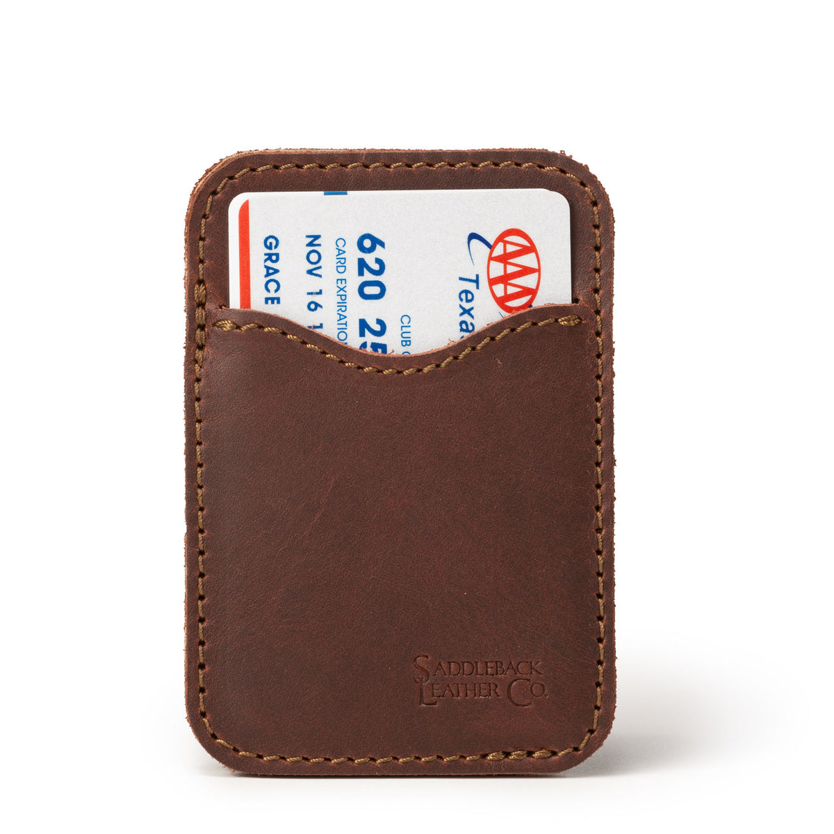 Slim Leather Card Wallet in Chestnut, front view with a card tucked in the curved front pocket