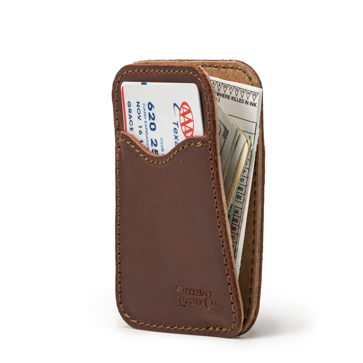 Slim Leather Card Wallet in Chestnut, angled view with a card in front and cash in the middle pocket