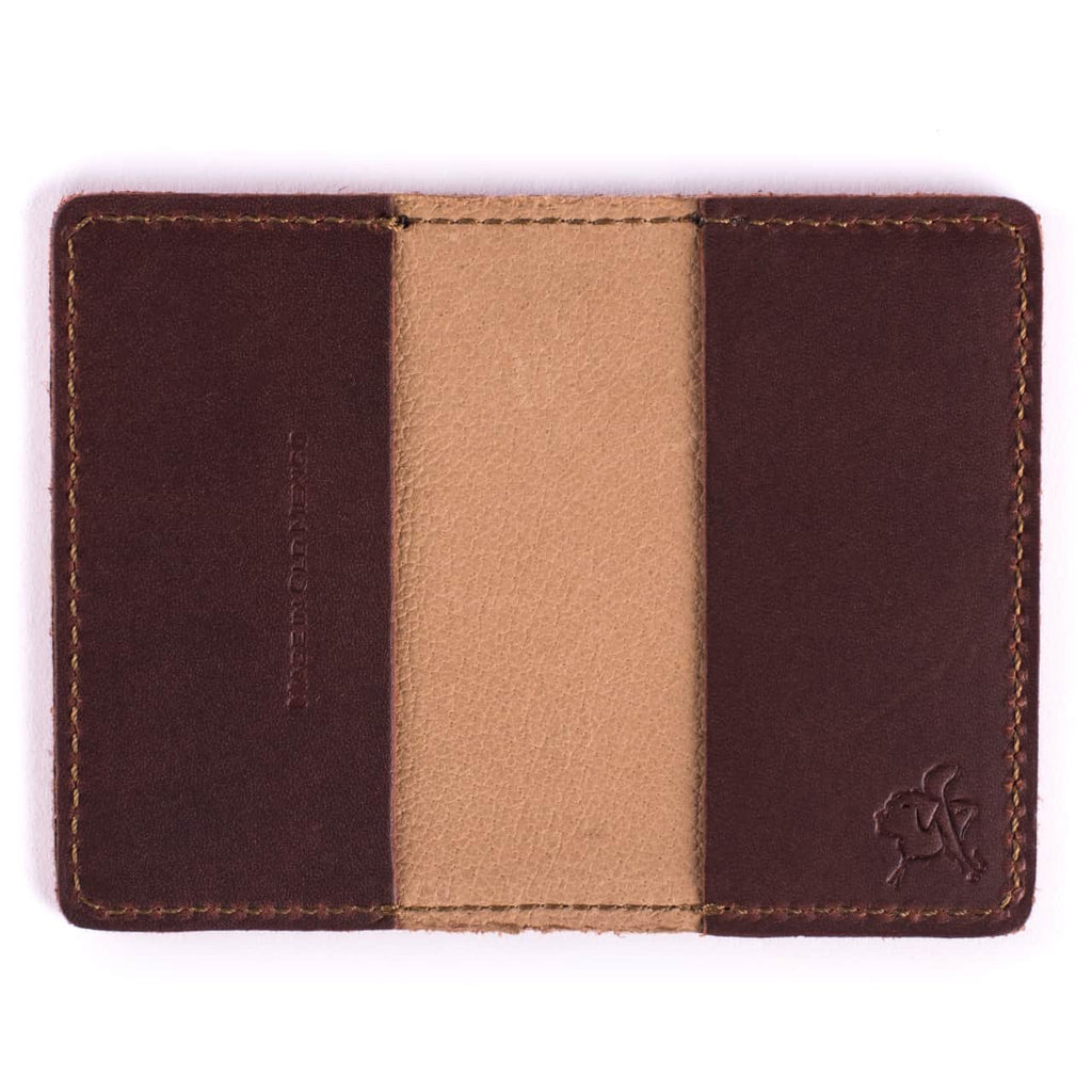 Slim Business Card Holder in Chestnut leather opened flat showing two empty inner pockets