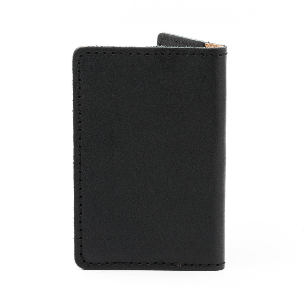 Slim Business Card Holder in Black leather, closed back view showing stitched edges