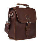 Indiana Leather Satchel in Chestnut, angled front view with buckled flap, top handle and shoulder strap