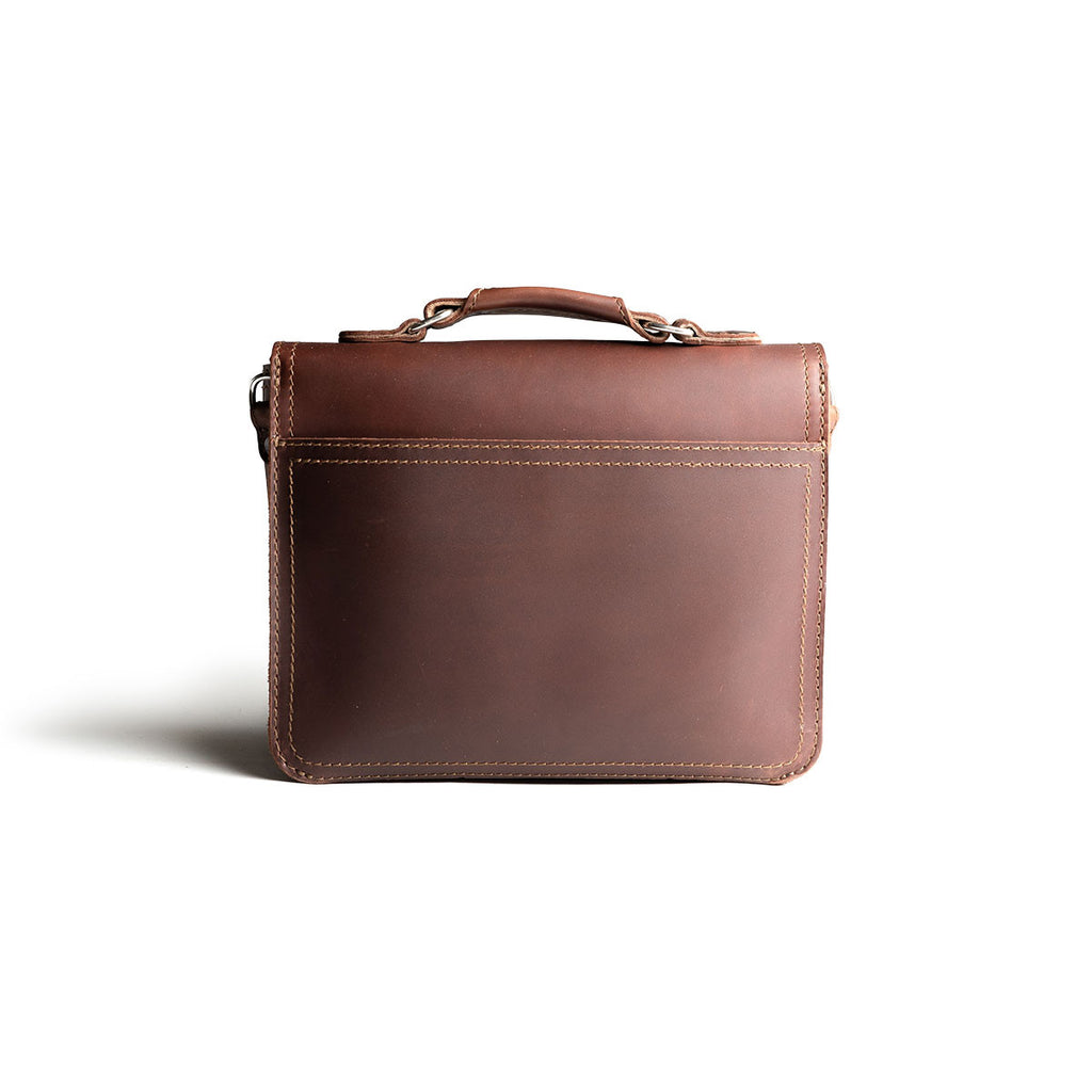 Front Pocket Leather Satchel in Chestnut, back view with top handle and stitched back panel