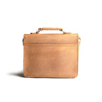 Front Pocket Leather Satchel in Tobacco, back view with top handle and stitched back panel