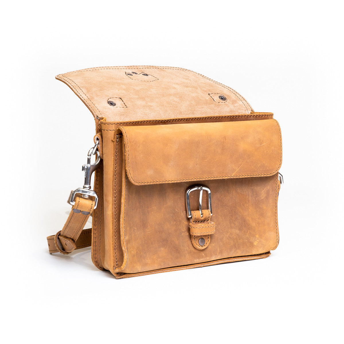 Front Pocket Leather Satchel in Tobacco with the flap folded back to reveal the buckled front pocket
