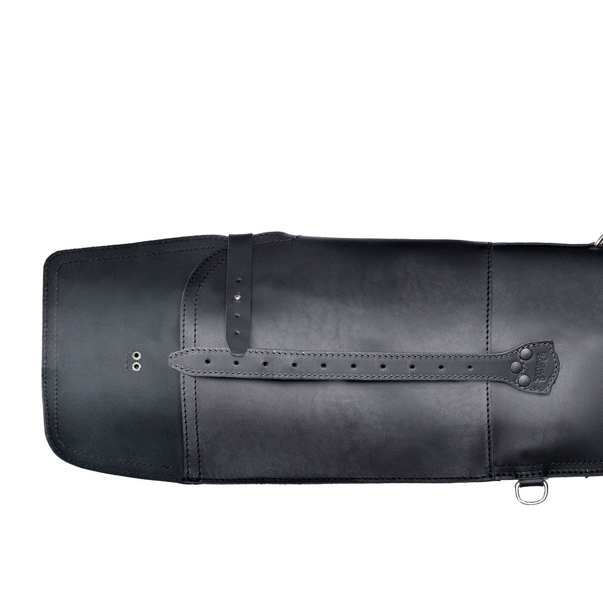 Shotgun Sleeve in Black, close-up of the end flap with its long leather closure strap