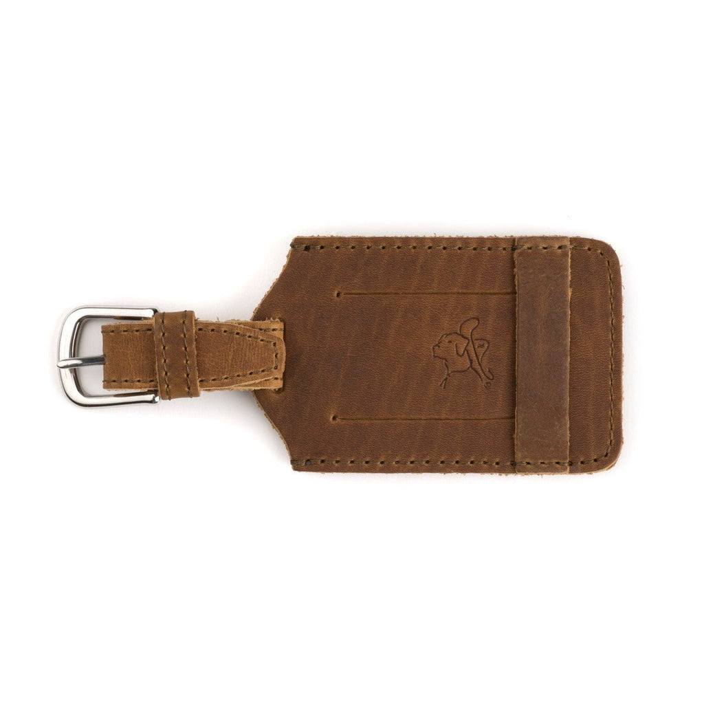 Leather Luggage Tag in Tobacco, back view with embossed tortoise and buckled strap