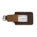 Leather Luggage Tag in Dark Coffee Brown with a business card in the window and buckled strap, front view