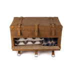 Leather Trunk in Tobacco with drop-front drawer open to show folded blankets and a flannel shirt